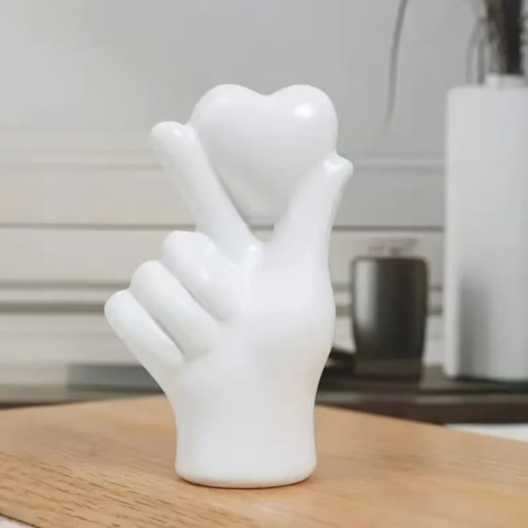 Heart hand gesture decor statue