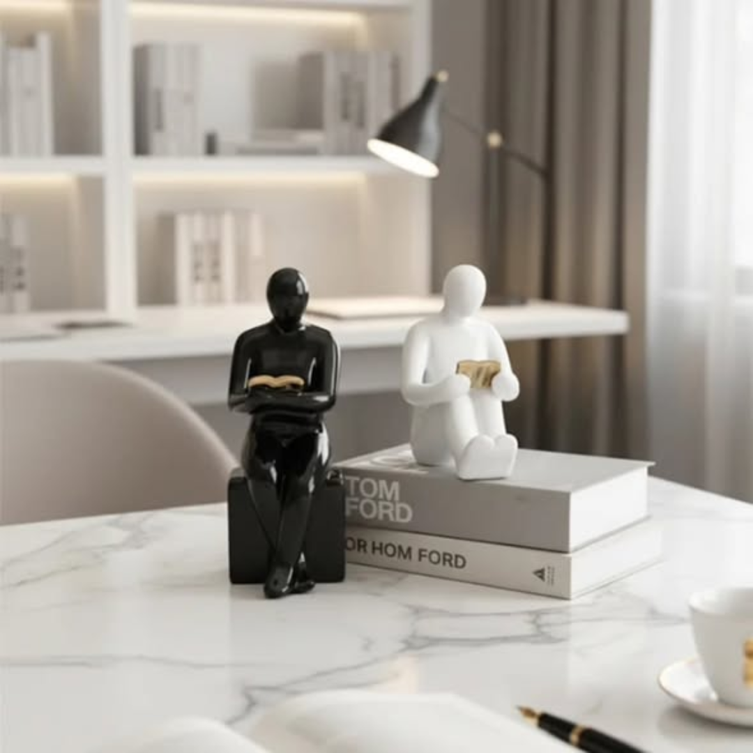 Ceramic bookends reader shape sculptures